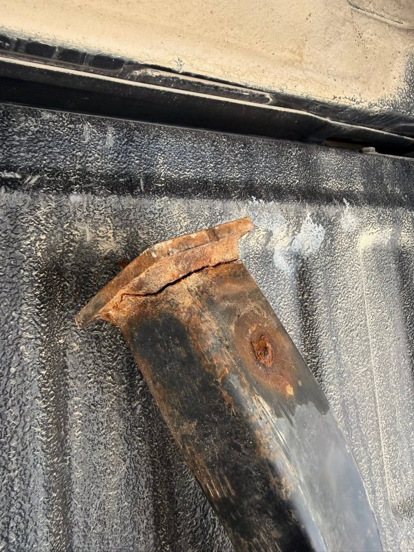 Metal repair on a rusted bracket