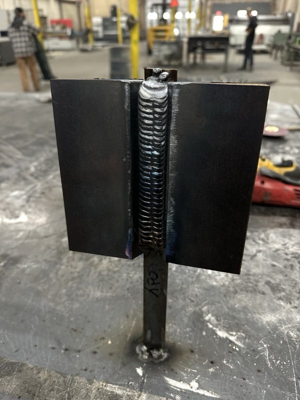 Welded steel post and bracket